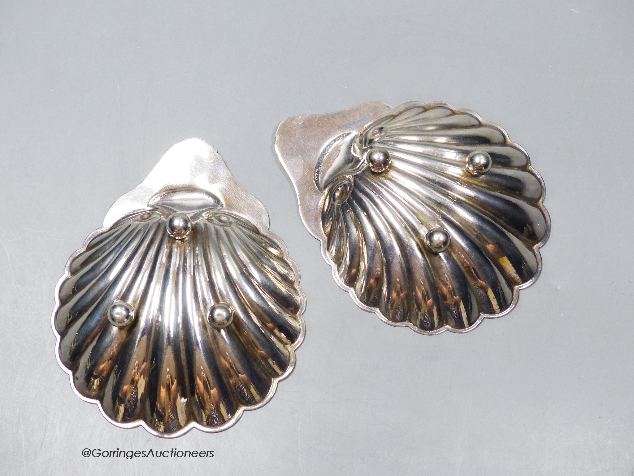A modern pair of silver shell dishes, Francis Howard Ltd, Sheffield, 1969, 10.5cm, 114 grams.